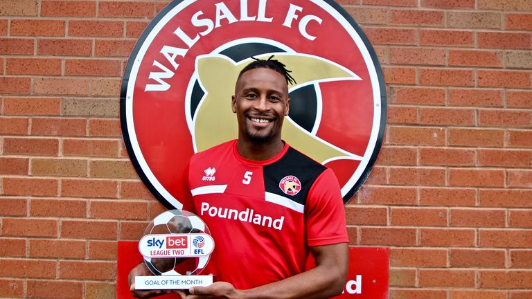 Walsall's Donervon Daniels with his League Two goal of the month award for January 2024
