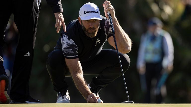 Captain Dustin Johnson of 4Aces GC lines up a putt on the eighth green during the final round of the LIV Golf Las Vegas at the Las Vegas Country Club on Saturday, February 10, 2024 in Las Vegas, United States. (Photo by Scott Taetsch/LIV Golf via AP)