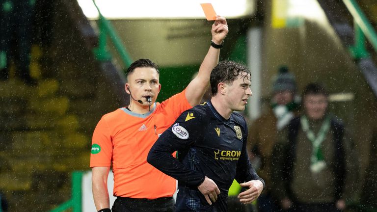 Dundee's Finlay Robertson is shown a red card