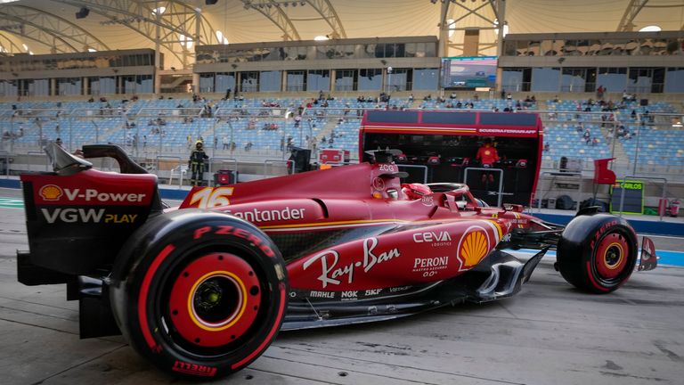 Ferrari driver Charles Leclerc of Monaco steers his car out of the garage for a Formula One pre season test at the Bahrain International Circuit in Sakhir, Bahrain, Friday, Feb. 23, 2024. (AP Photo/Darko Bandic)
