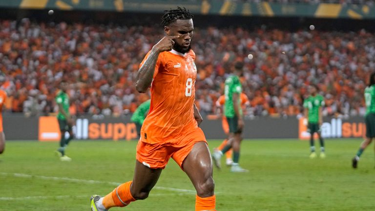 Franck Kessie celebrates Ivory Coast's equaliser