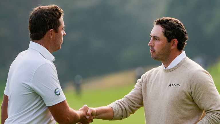 Luke List shakes hands with Patrick Cantlay at the end of the third round