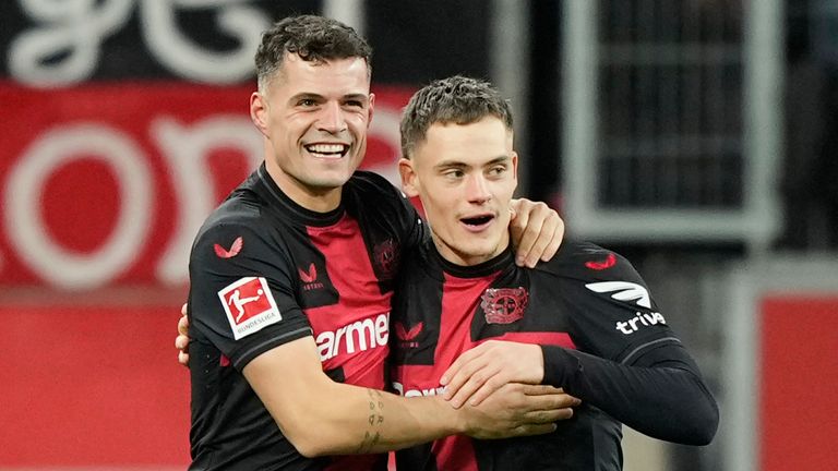Leverkusen's Granit Xhaka celebrates with team-mates after scoring vs Mainz