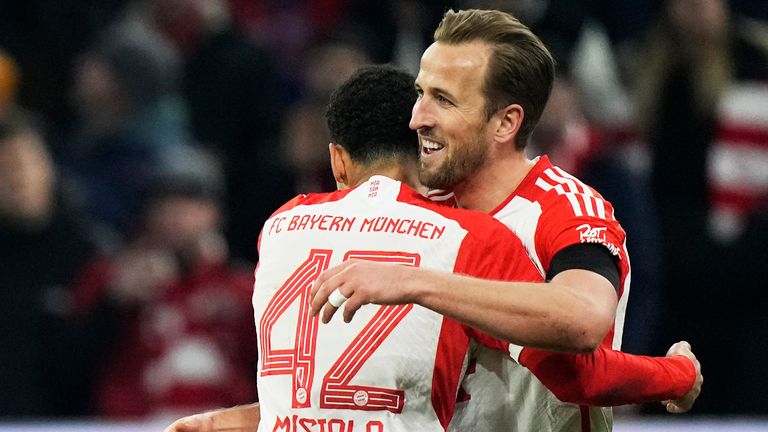 Bayern's Harry Kane celebrates his goal with team-mate Jamal Musiala