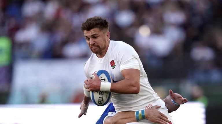 England's Henry Slade is tackled by Italy's Tommaso Menoncello during the Guinness Six Nations match at the Stadio Olimpico in Rome, Italy. Picture date: Saturday February 3, 2024.