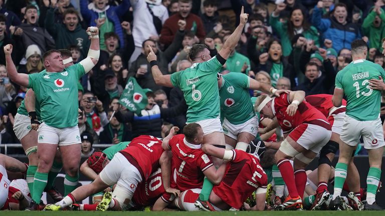 Ireland's Peter O'Mahony (centre) and team-mates celebrate after Dan Sheehan (hidden) scores their side's first try 
