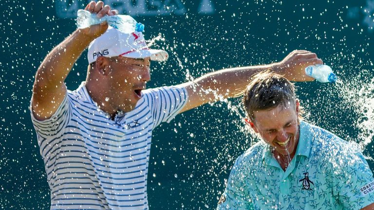 Jake Knapp of the United States is showered with water bottles as he celebrates after winning the Mexico Open golf tournament in Puerto Vallarta, Mexico, Sunday, Feb. 25, 2024. (AP Photo/Fernando Llano)