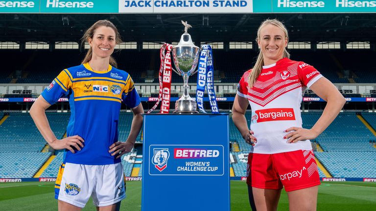 Picture by Allan McKenzie/SWpix.com - 03/05/2022 - Rugby League - Betfred Challenge Cup Semi Final Triple Header Preview - Elland Road, Leeds, England - Leeds Rhinos women's Courtney Winfield-Hill & St Helens women's Jodie Cunningham with the Betfred Women's Challenge Cup.