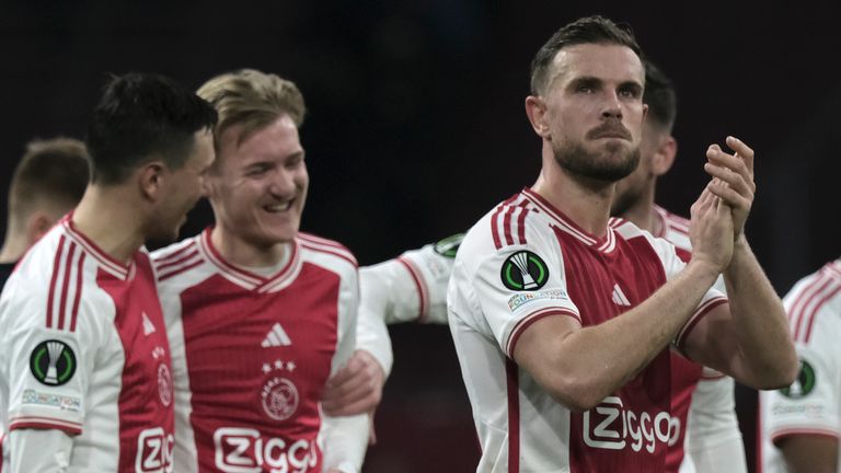 Ajax's Jordan Henderson applauds spectators after the Europa Conference League knockout round play-off first leg soccer match between Ajax and Bodo Glimt in Amsterdam, the Netherlands, Thursday, Feb. 15, 2024. The match ended in a 2-2 draw. (AP Photo/Patrick Post)