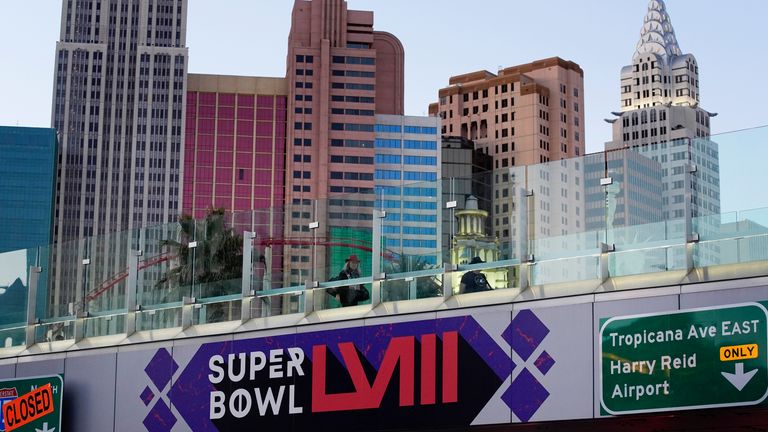 A sign for Super Bowl 58 adorns a pedestrian walkway across the Las Vegas Strip ahead of the Super Bowl, Tuesday, Jan. 30, 2024, in Las Vegas. (AP Photo/John Locher)