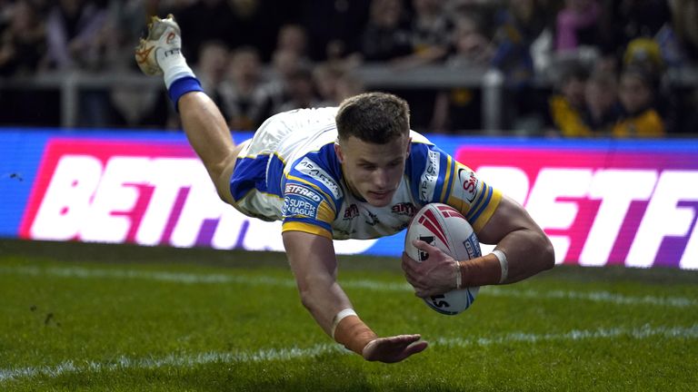 Leeds Rhinos v Salford Red Devils - Betfred Super League - Headingley Stadium
Leeds Rhinos' Ash Handley scores his side's first try of the game during the Betfred Super League match at Headingley Stadium, Leeds. Picture date: Friday February 16, 2024.