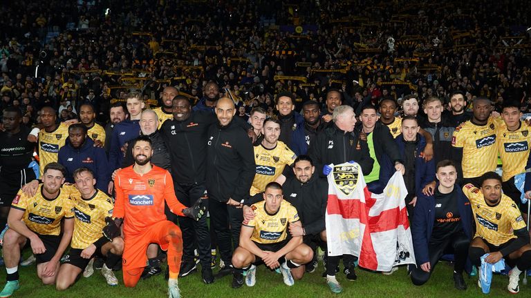 Maidstone United players and staff after the Emirates FA Cup fifth round match at the Coventry Building Society Arena, Coventry. Picture date: Monday February 26, 2024.