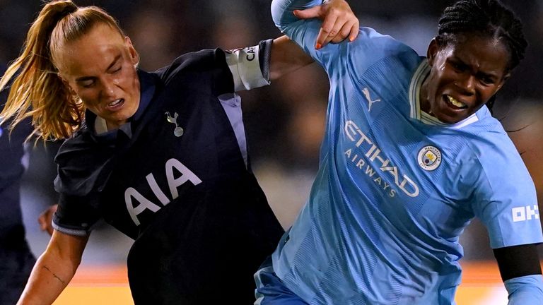 Manchester City's Khadija Shaw (right) and Tottenham Hotspur's Molly Bartrip battle for the ball during the Barclays Women's Super League match at Manchester City Joie Stadium, Manchester. Picture date: Sunday November 26, 2023.