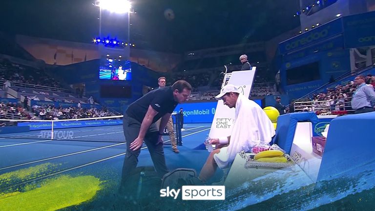 Andy Murray calls for his trainer after feeling a twinge in his knee during his Qatar Open match against Alexandre Muller