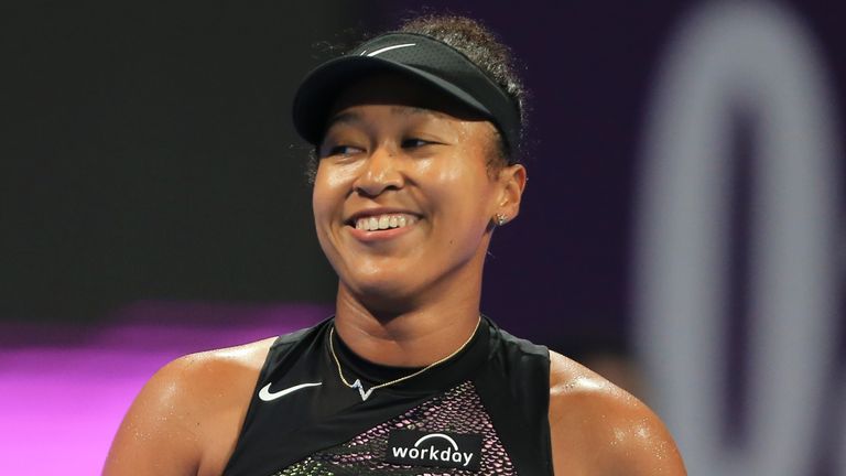 Japan's Naomi Osaka reacts during a match against France's Caroline Garcia during the Qatar Open in Doha, Qatar, on Monday, Feb. 12, 2024.AP Photo/Hussein Sayed)