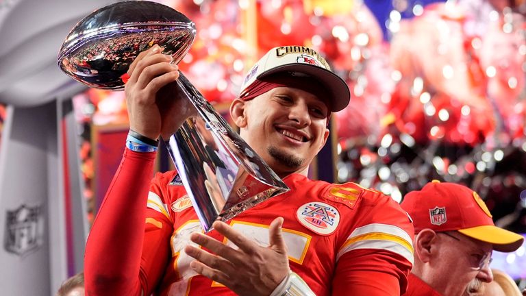 Patrick Mahomes celebrates with the Vince Lombardi trophy