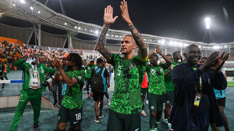 Nigeria's defender #5 William Troost-Ekong (C) celebrates after the victory at the end of the Africa Cup of Nations (CAN) 2024 quarter-final football match between Nigeria and Angola at the Felix Houphouet-Boigny Stadium in Abidjan on February 2, 2024. (Photo by Issouf SANOGO / AFP)