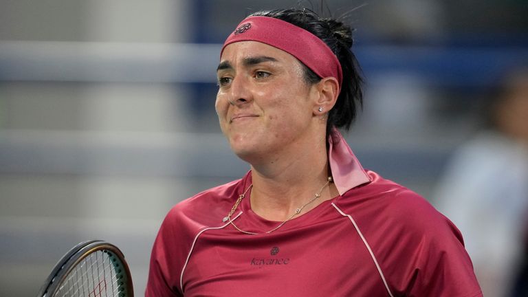 Ons Jabeur of Tunisia reacts after she got a point against Beatriz Haddad Maia of Brazil during a quarter finals match of the Mubadala Abu Dhabi Open tennis tournament, in Abu Dhabi, United Arab Emirates, Friday, Feb. 9, 2024. (AP Photo/Kamran Jebreili)