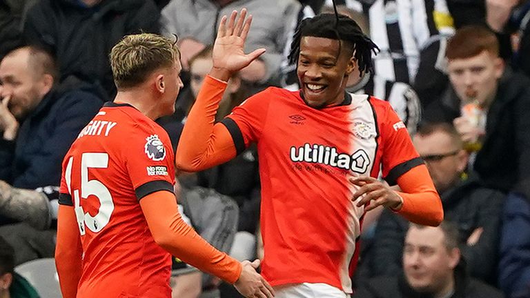 Gabriel Osho celebrates with Alfie Doughty after equalising for Luton at Newcastle