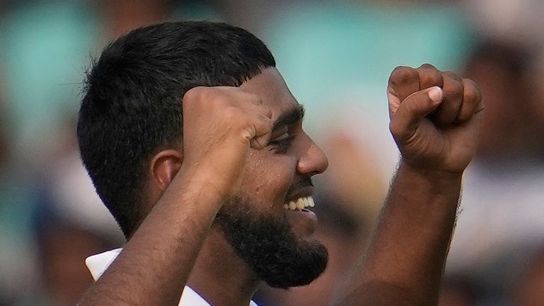 England's Rehan Ahmed celebrates the wicket of India's Rajat Patidar on the first day of the second cricket test match between India and England in Visakhapatnam, India, Friday, Feb. 2, 2024. (AP Photo/Manish Swarup)
