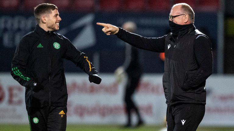 DINGWALL, SCOTLAND - FEBERUARY 21: Celtic's Ryan Christie with his former Manager at Inverness CT John Hughes during a Scottish Premiership match between Ross County and Celtic at The Global Energy Stadium on February 21, 2021, in Dingwall, Scotland (Photo by Ross Parker / SNS Group)