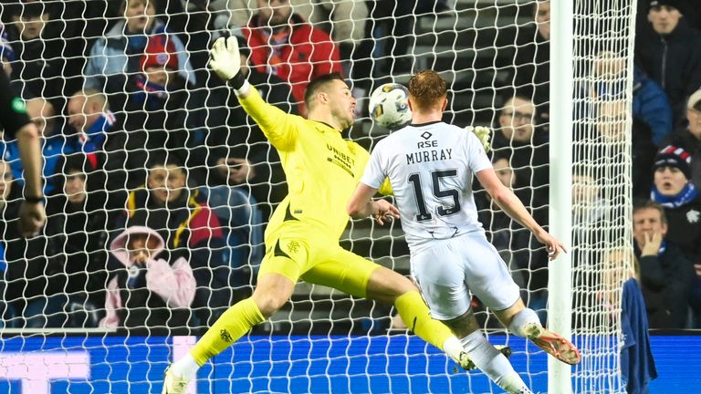 GLASGOW, SCOTLAND - FEBRUARY 14: Ross County's Simon Murray scores to make it 1-1 during a cinch Premiership match between Rangers and Ross County at Ibrox Stadium, on February 14, 2024, in Glasgow, Scotland.  (Photo by Rob Casey / SNS Group)