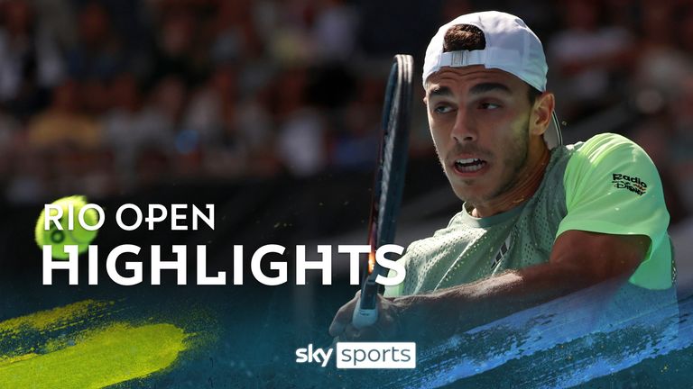 Francisco Cerundolo of Argentina plays a backhand return to Dane Sweeny of Australia during their first round match at the Australian Open tennis championships at Melbourne Park, Melbourne, Australia, Sunday, Jan. 14, 2024. (AP Photo/Asanka Brendon Ratnayake)


