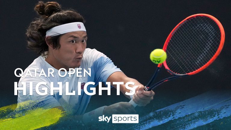 Zhang Zhizhen of China plays a backhand return to Ugo Humbert of France during their second round match at the Australian Open tennis championships at Melbourne Park, Melbourne, Australia, Thursday, Jan. 18, 2024. (AP Photo/Alessandra Tarantino)


