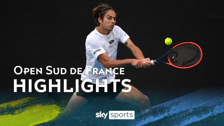 Flavio Cobolli of Italy plays a backhand return to Alex de Minaur of Australia during their third round match at the Australian Open tennis championships at Melbourne Park, Melbourne, Australia, Friday, Jan. 19, 2024. (AP Photo/Alessandra Tarantino)



