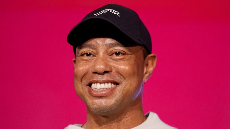 Tiger Woods smiles at a news conference ahead of the Genesis Open golf tournament, Monday, Feb. 12, 2024, in the Pacific Palisades area of Los Angeles. (AP Photo/Eric Thayer)