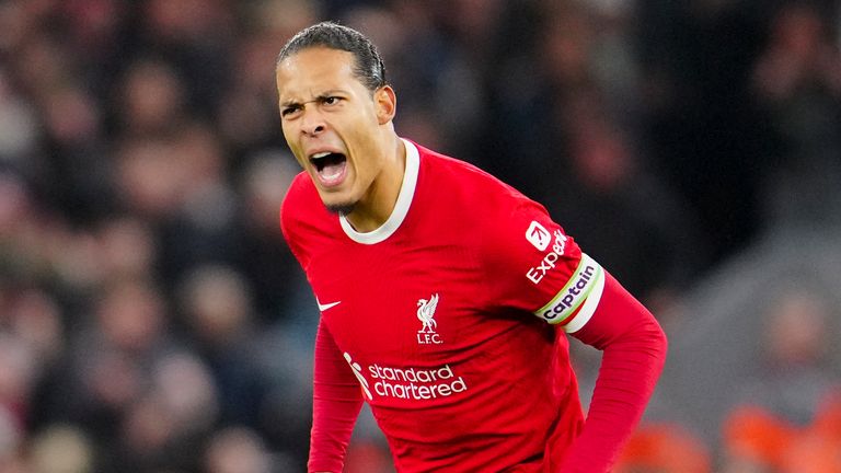 Liverpool's Virgil van Dijk celebrates after scoring his side's first goal during the English Premier League soccer match between Liverpool and Luton Town, at Anfield stadium in Liverpool, England, Wednesday, Feb. 21, 2024. (AP Photo/Jon Super)