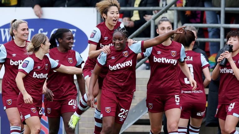 Hawa Cissoko celebrates with her team-mates after giving West Ham a shock lead against Arsenal