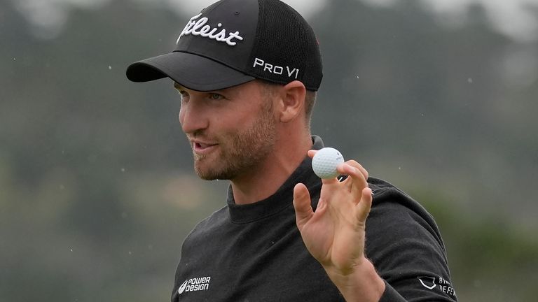 Wyndham Clark gestures after making a birdie putt on the 18th hole at Pebble Beach Golf Links during the third round of the AT&T Pebble Beach National Pro-Am golf tournament in Pebble Beach, Calif., Saturday, Feb. 3, 2024. (AP Photo/Ryan Sun)