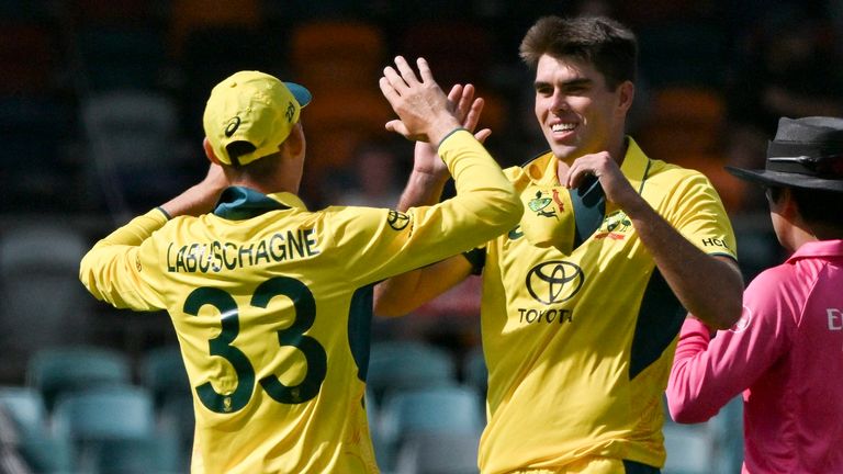 Australia...s paceman Xavier Bartlett (C) celebrates his wicket of West Indies... batsman Alzarri Joseph during the third one-day international (ODI) cricket match between Australia and West Indies at Manuka Oval in Canberra on February 6, 2024. (Photo by Saeed KHAN / AFP) / -- IMAGE RESTRICTED TO EDITORIAL USE - STRICTLY NO COMMERCIAL USE --