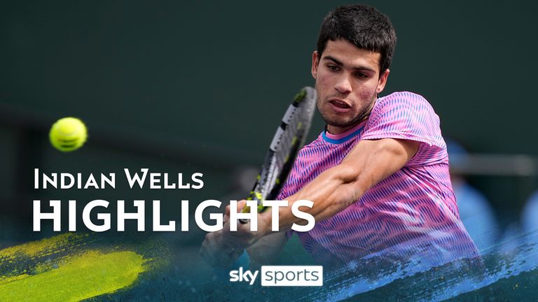 Carlos Alcaraz, of Spain, returns a shot against Felix Auger-Aliassime, of Canada, at the BNP Paribas Open tennis tournament in Indian Wells, Calif., Sunday, March 10, 2024.