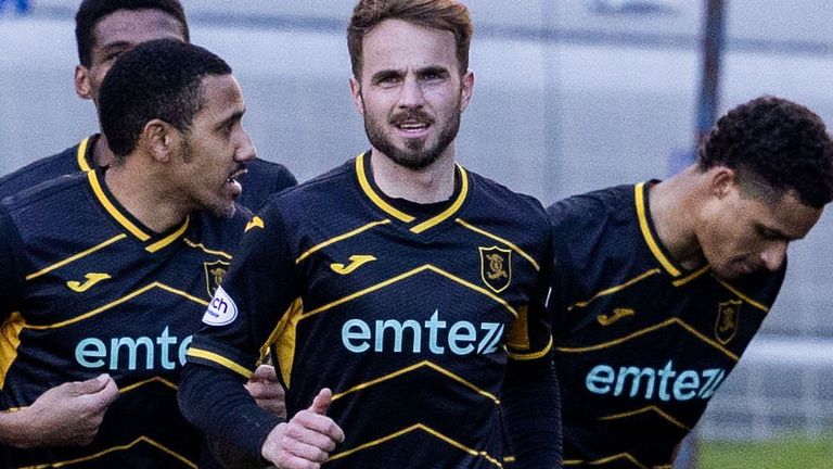 PERTH, SCOTLAND - MARCH 02: Livingston's Andrew Shinnie (C) celebrates scoring to make it 1-0 with his teammates during a cinch Premiership match between St Johnstone and Livingston at McDiarmid Park, on March 02, 2024, in Perth, Scotland. (Photo by Mark Scates / SNS Group)