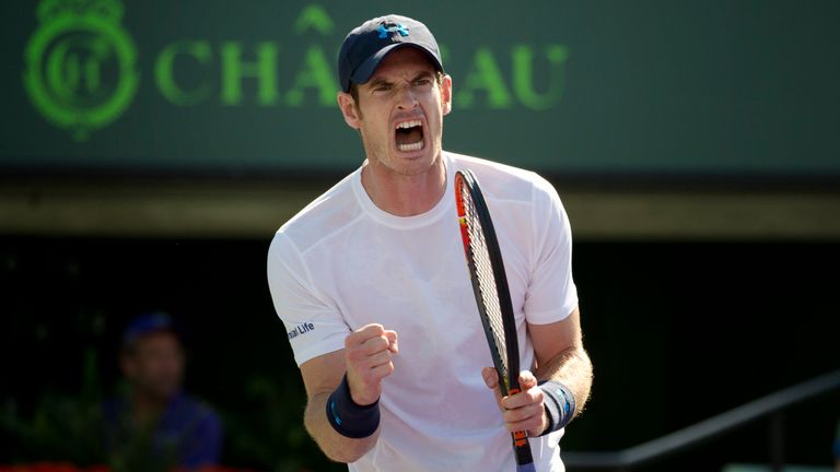 Andy Murray, of Great Britain, celebrates winning a game against Kevin Anderson, of South Africa, during their match at the Miami Open tennis tournament in Key Biscayne, Fla., Tuesday, March 31, 2015. (AP Photo/J Pat Carter)