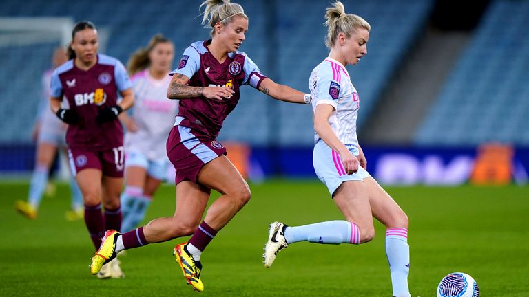 Rachel Daly chases down Leah Williamson for the ball in their WSL contest at Villa Park