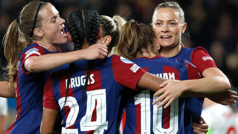 Barcelona's Fridolina Rolfo, right, celebrates with teammates after scoring her side's second goal during the women's Champions League quarterfinals, second leg, soccer match between FC Barcelona and SK Brann Kvinner at the Estadi Johan Cruyff in Barcelona, Spain, Thursday, March 28, 2024. (AP Photo/Joan Monfort)