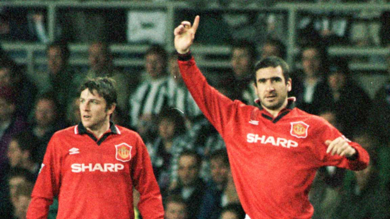  Eric Cantona celebrates scoring the only goal of the match  against Newcastle United at St James's Park.