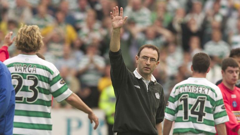 A dejected Celtic boss Martin O'Neill salutes the the fans after the final whistle at Kilmarnock