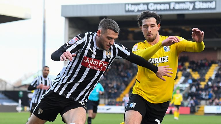 Aden Baldwin of Notts County is battling with Cole Stockton of Barrow during the Sky Bet League 2 match between Notts County and Barrow at Meadow Lane in Nottingham, on January 27, 2024. (Photo by MI News/NurPhoto)