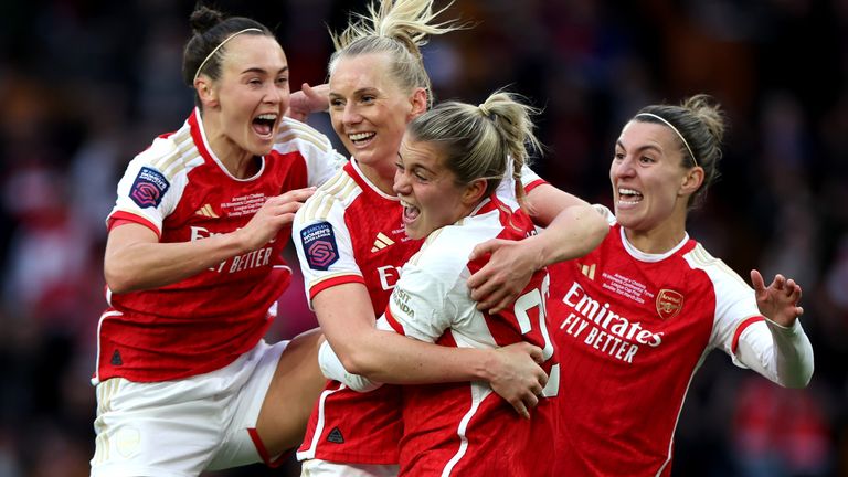 Stin Blackstenius celebrates with her team-mates after giving Arsenal the lead in extra-time of the Conti Cup final