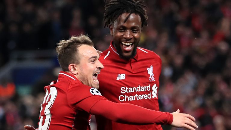 Liverpool's Divock Origi (right) celebrates scoring his side's fourth goal of the game during the UEFA Champions League Semi Final, second leg match at Anfield, Liverpool.