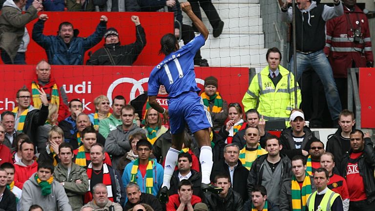  Didier Drogba celebrates in front of Manchester United fans after scoring their second goal