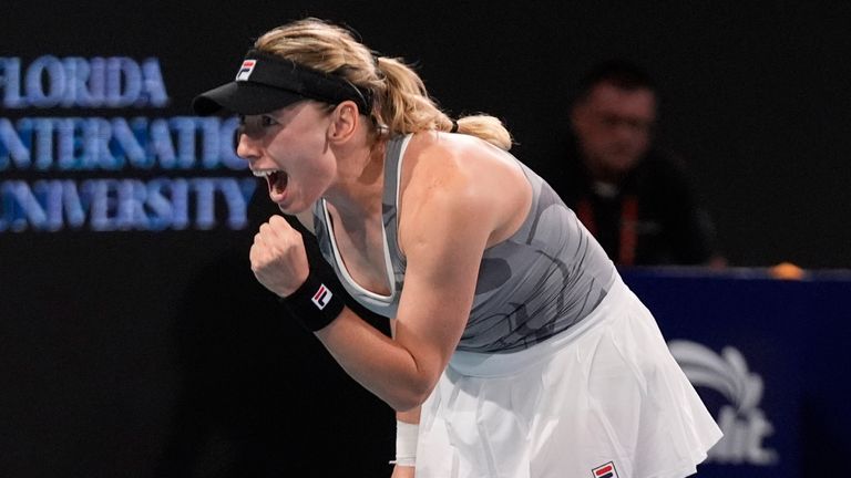 Ekaterina Alexandrova, of Russia, celebrates after beating Iga Swiatek, of Poland, during the Miami Open tennis tournament, Monday, March 25, 2024, in Miami Gardens, Fla. (AP Photo/Wilfredo Lee)