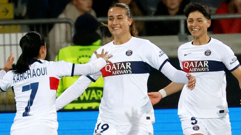 Eva Gaetino (centre) celebrates scoring for PSG with teammates Sakina Karchaoui (left) and Elisa De Almeida (right)