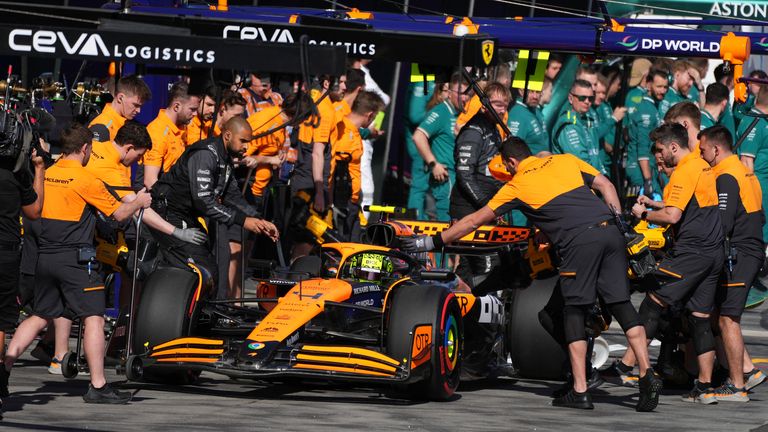 McLaren&#39;s British driver Lando Norris leaves after a pit stop during the qualifying session of the Formula One Australian Grand Prix at the Albert Park Circuit in Melbourne on March 23, 2024. 