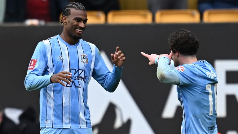 Haji Wright celebrates with team-mate Callum O'Hare after scoring a 99th minute winner for Coventry at Wolves