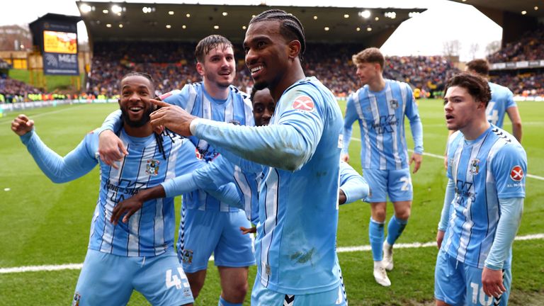 Coventry players celebrate Haji Wright's late winner at Molineux